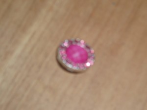 Drukker roze steen met strass